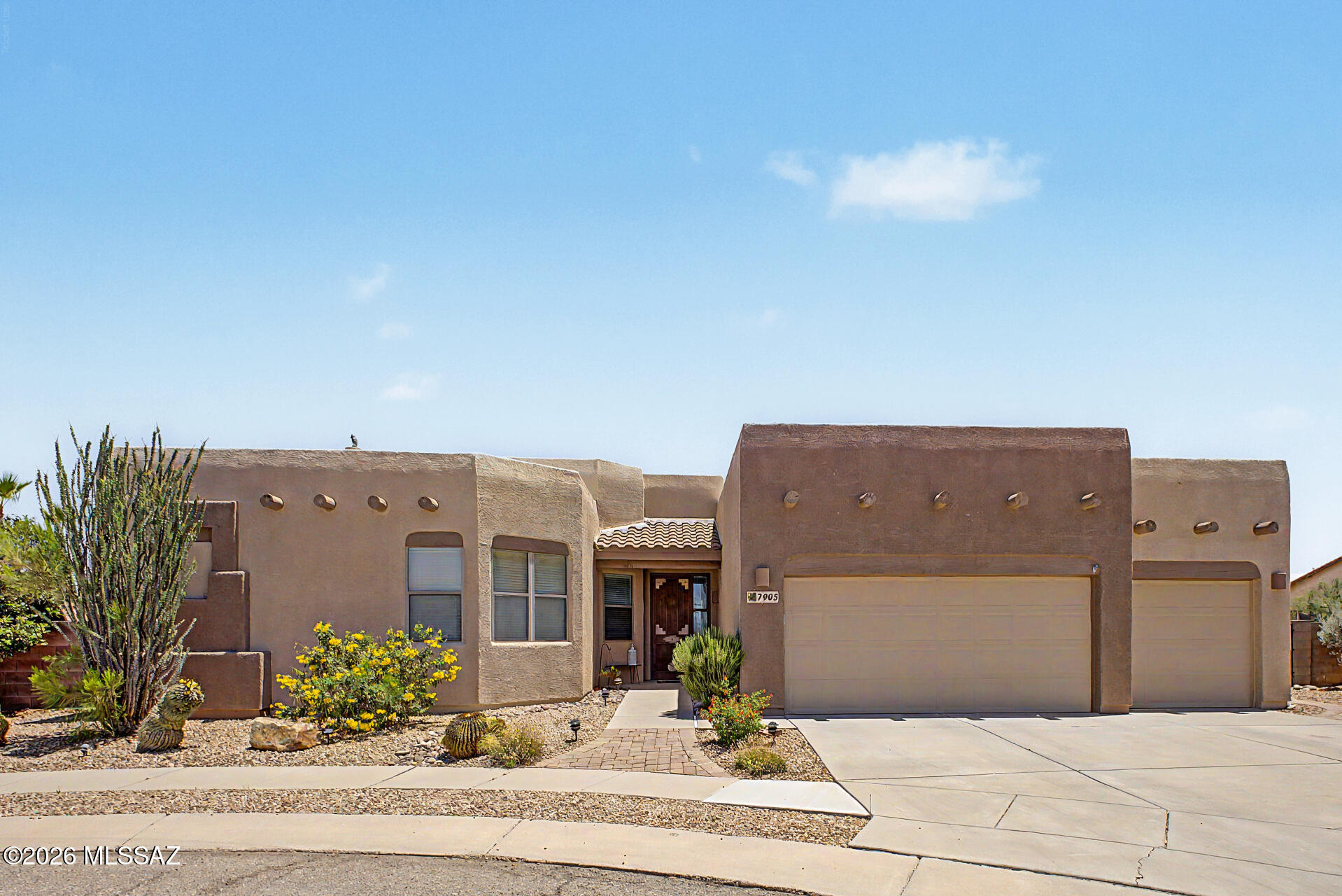 Privacy and comfort come together in this beautifully maintained 2,499 sq. ft. home ideally located at the end of a peaceful cul-de-sac. It features four bedrooms, two bathrooms, laundry room with utility sink and has a desirable split floor plan. This home offers both functionality and space for everyday living. 

The layout provides separate living areas while two covered patios extend the living space outdoors, creating the perfect space for relaxation. A spacious three car garage with built in cabinets, workspace and lots of storage shelves, RV gate and storage shed. It has attractive, low maintenance desert landscaping with wired lighting in the front and backyard which highlights the properties outdoor beauty and creates an inviting atmosphere after sunset. This home offers a rare combination of luxury and tranquil setting. 

Step inside to discover soaring ceilings, ceramic tile, carpet, and LVP flooring throughout the home. The spacious family room features a gas fireplace with views of the pool and backyard, providing a warm and inviting gathering space for every day, living.  

The beautiful kitchen has style and functionality in mind featuring quartz countertops, white pullout cabinetry with lighting and crown molding. Stainless steel appliances, pendants, recessed lighting and wine refrigerator. Large island seats four comfortably. Adjoining breakfast nook offers a casual dining option while the formal dining area just off the living room provides a perfect setting for holiday gatherings, special occasions, and dinner parties. 

The spacious primary bedroom offers side backyard access through sliding glass door. with fountain & desert view. It has a spa-like en-suite featuring dual vanities, a large shower with cultured marble walls, and teak flooring as well as a walk-in closet and linen closet. The remaining bedrooms are ample size and share the hallway bathroom. 

Step outside to your own backyard retreat complete with a large covered patio and corner hot tub. Built in BBQ, gas or wood burning fireplace. The sparkling salt water pool has a soothing water fall feature.  Plenty of entertainment space!

This home combines comfort, style and resort style amenities in one incredible package. This is an exceptional place to call home.