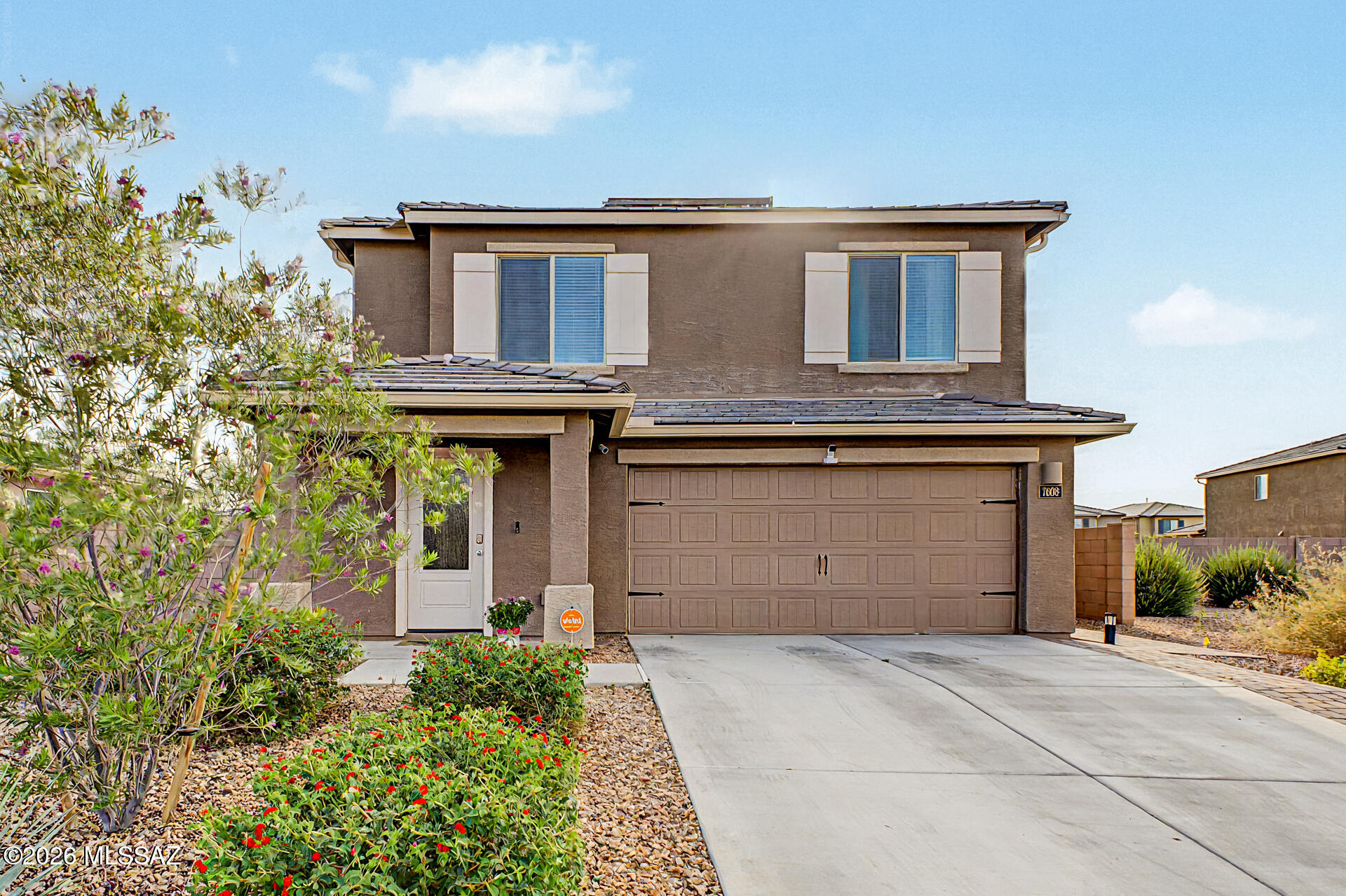 Better than new and move-in ready! Built in 2024, this spacious 2,327 sq. ft. home offers 5 bedrooms, 3 full bathrooms, and a versatile floor plan designed for modern living. Situated on a .14-acre lot, this home combines the benefits of new construction with thoughtful upgrades already completed for you. The well-appointed kitchen features Energy Star appliances, granite countertops, and opens seamlessly to the main living and dining areas, creating an ideal space for everyday living and entertaining. Owner-added improvements include a built-in BBQ, custom walkways, whole-house water purification system, water softener, and Tuff Shed. Enjoy beautifully improved outdoor spaces, a two-car garage, and the convenience of a truly turnkey home without the wait and expense of building new.
