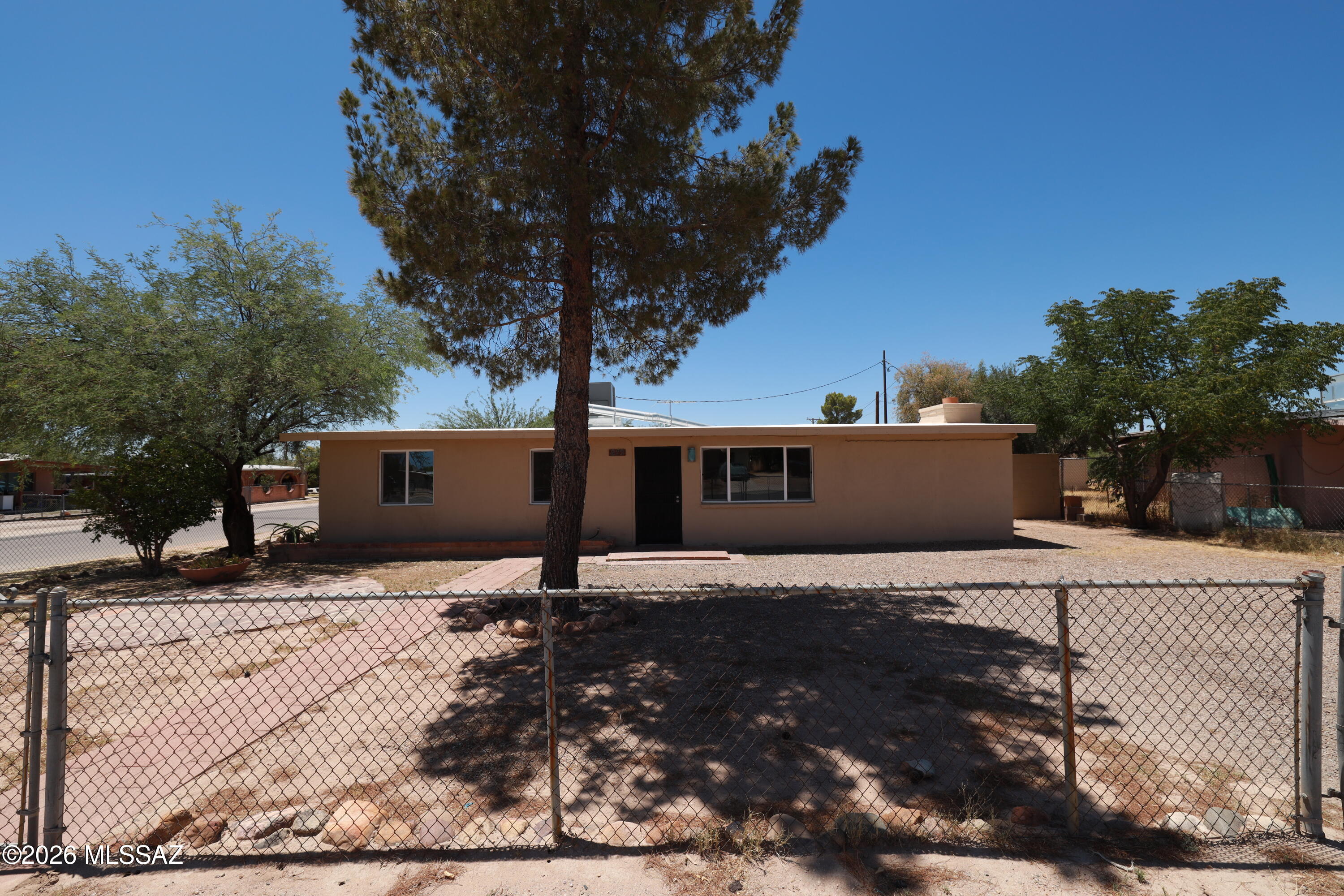 Move-in ready 4-bedroom, 2-bath home with 1,495 sq. ft. on a desirable 0.16-acre corner lot. Features include a cozy fireplace, fresh interior and exterior paint, new dual-pane windows, recently replaced roof, 2-year-old A/C, new kitchen sink, and updated bathrooms with new sinks and toilets. The spacious backyard offers a large covered patio, built-in BBQ, double RV gate, and two storage sheds--perfect for entertaining and extra storage. Priced to sell!
