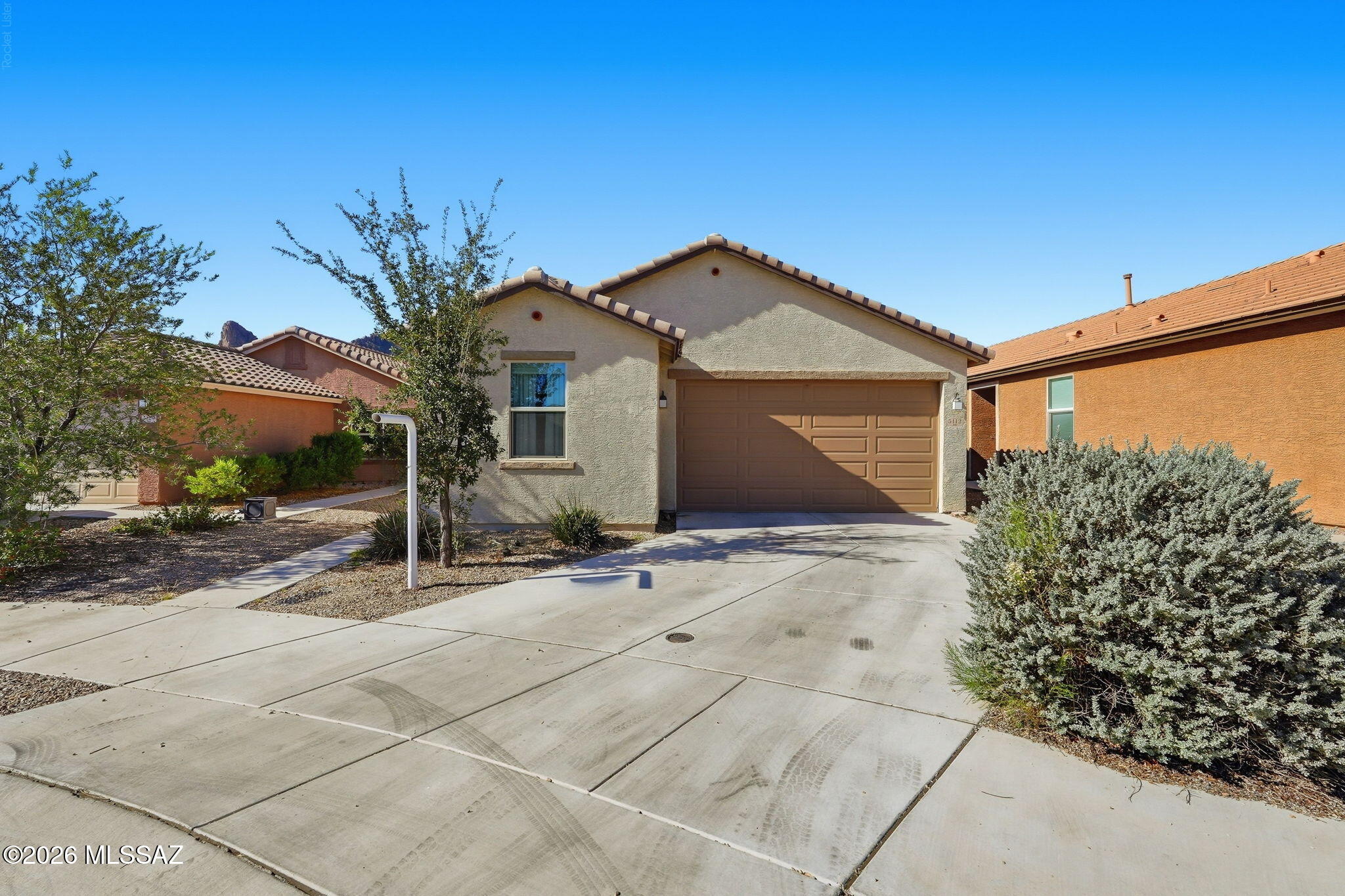 Charming single-story home is now on the market! This gem is nestled in a quiet cul-de-sac with beautiful mountain views, offering 3 bedrooms, 2 bathrooms, and a 2-car garage. The interior showcases tile floors, abundant natural light, and a neutral palette that pairs well with any decor, all set against a practical layout perfect for entertaining and easy everyday living. The open-concept kitchen boasts pristine white cabinetry, ample counter space, built-in appliances, and an island, perfect for midnight snacks and meal prep. The primary bedroom promises a good night's sleep, complete with an ensuite with dual sinks for added privacy. Get ready for weekend grills and peaceful evenings in the backyard, including a covered patio ideal for morning coffee and a nice seating space where you can enjoy outdoor dining with the stunning mountains as the backdrop. Hurry up, this one will sell fast!