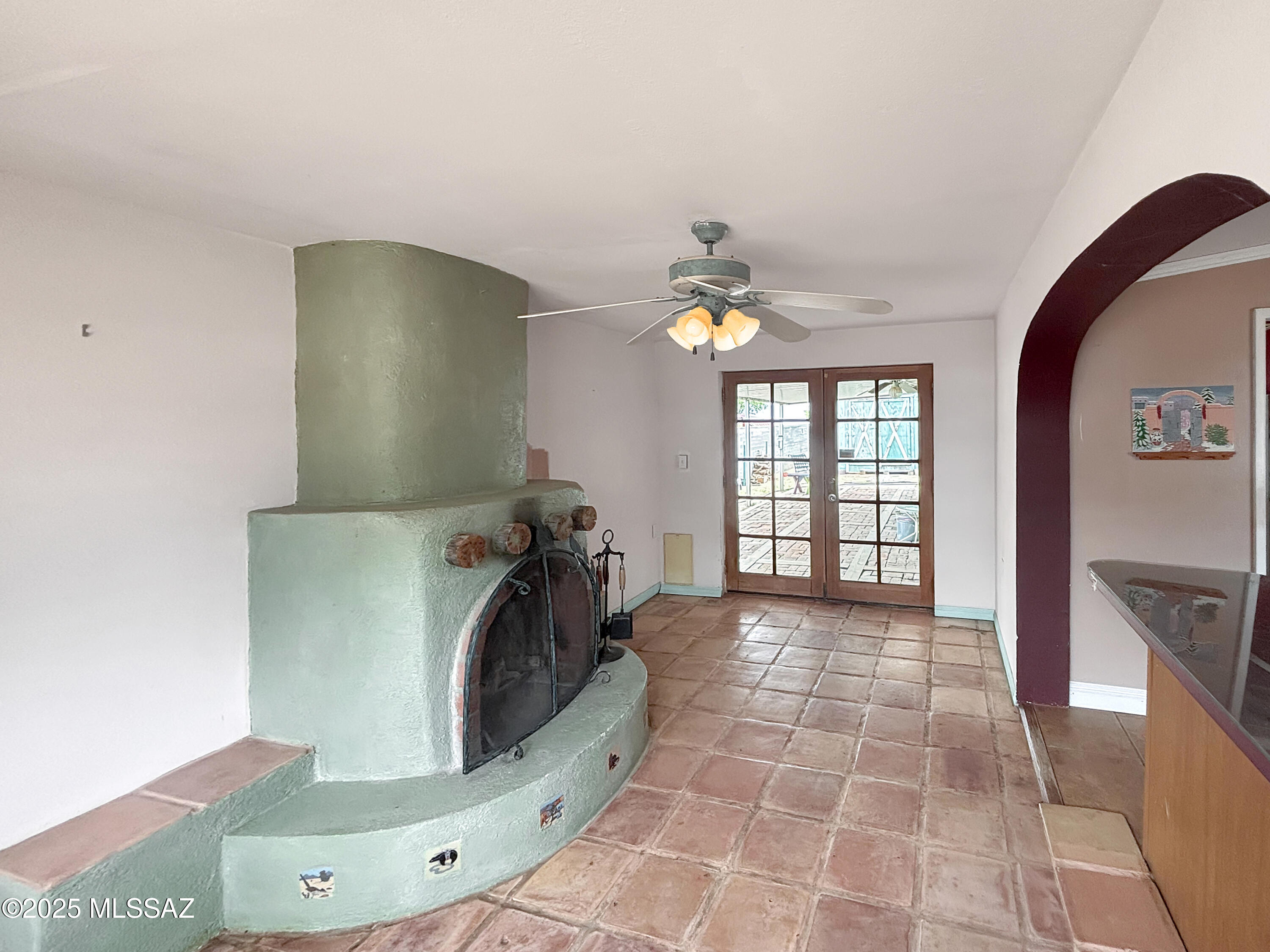 Charming 3-bedroom, 2-bath home with great potential, ready for your personal touch. Features include a spacious, block-fenced backyard with alley access, two unique sheds (a ''he shed'' and a ''she shed''), and a welcoming paver driveway. Relax on the covered paver patio and take in beautiful mountain views. Some TLC will make this home truly shine.