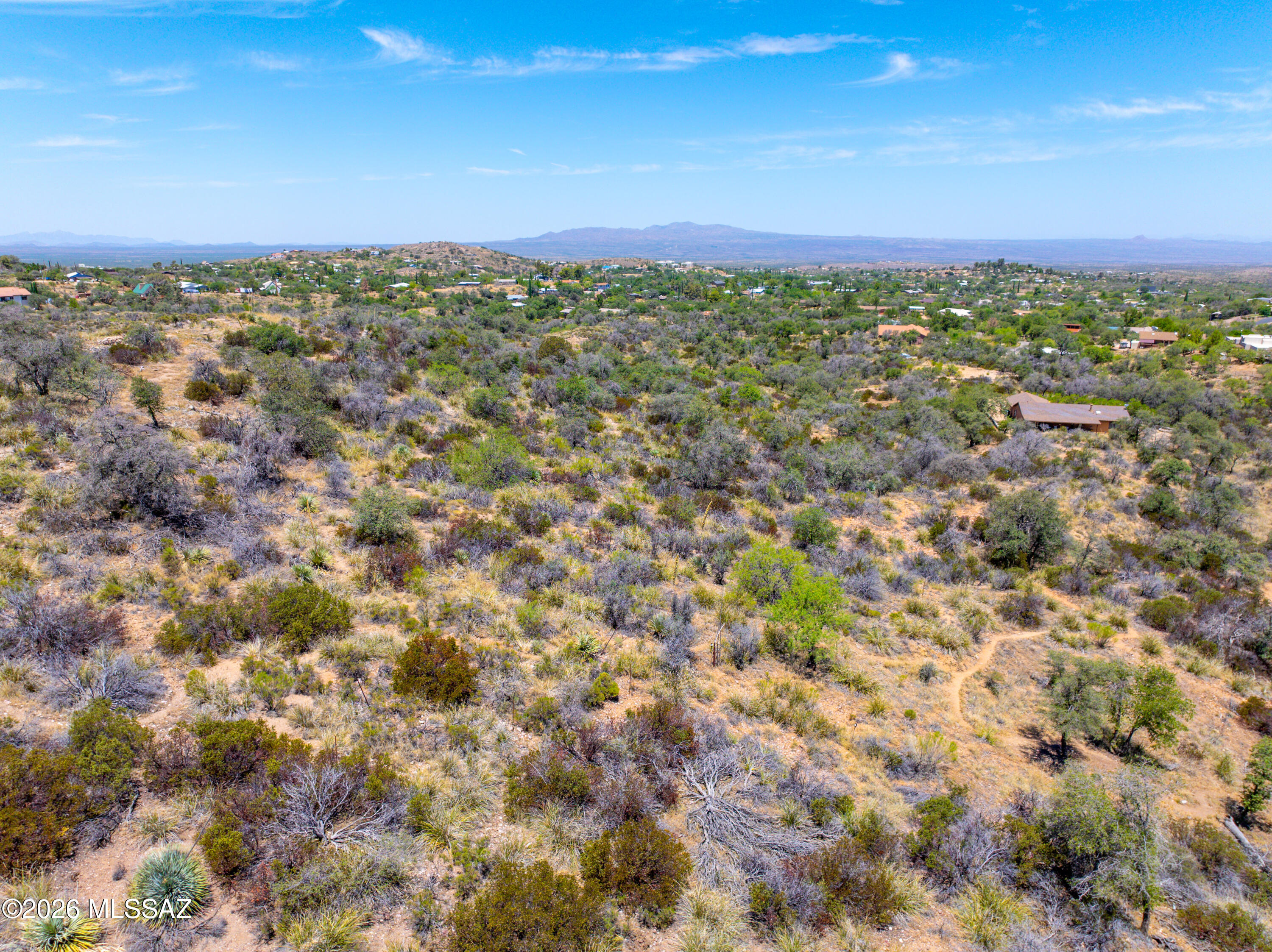 Escape to your own slice of the high desert on this 1.08-acre homesite tucked into one of the Oracle's most sought-after neighborhoods. Surrounded by native oak, mesquite, and rolling hills, this parcel offers the kind of privacy and natural beauty that's becoming harder to find close to town.

From the lot, take in sweeping, unobstructed views of the surrounding mountain ranges, a backdrop that changes with the light throughout the day and makes this a true build-your-dream-home setting. The elevated position captures cooling breezes and long sightlines in every direction. With its combination of acreage, privacy, and view, this parcel represents strong long-term potential for a custom estate build in a neighborhood that continues to attract discerning buyers. Access is via a rustic, unpaved road. part of the charm for buyers seeking an off-the-beaten-path feel.

Property Highlights:
- 1.08 acres in a desirable, established neighborhood on Oak Hills Dr
- Panoramic mountain views with strong custom-build potential
- No HOA! Bring your vision and build on your own timeline
- Mature native desert landscape throughout
- Quiet, private setting with nearby custom homes
- Short drive from Tucson

Whether you're planning a custom home, a weekend retreat, or a long-term investment, this Oak Hills Dr parcel offers space, views, and freedom without the restrictions of an HOA. Come check it out! 

A high-clearance vehicle is recommended for the drive directly to the lot; however, it can be easily reached via a short walk for those touring in a standard vehicle.
