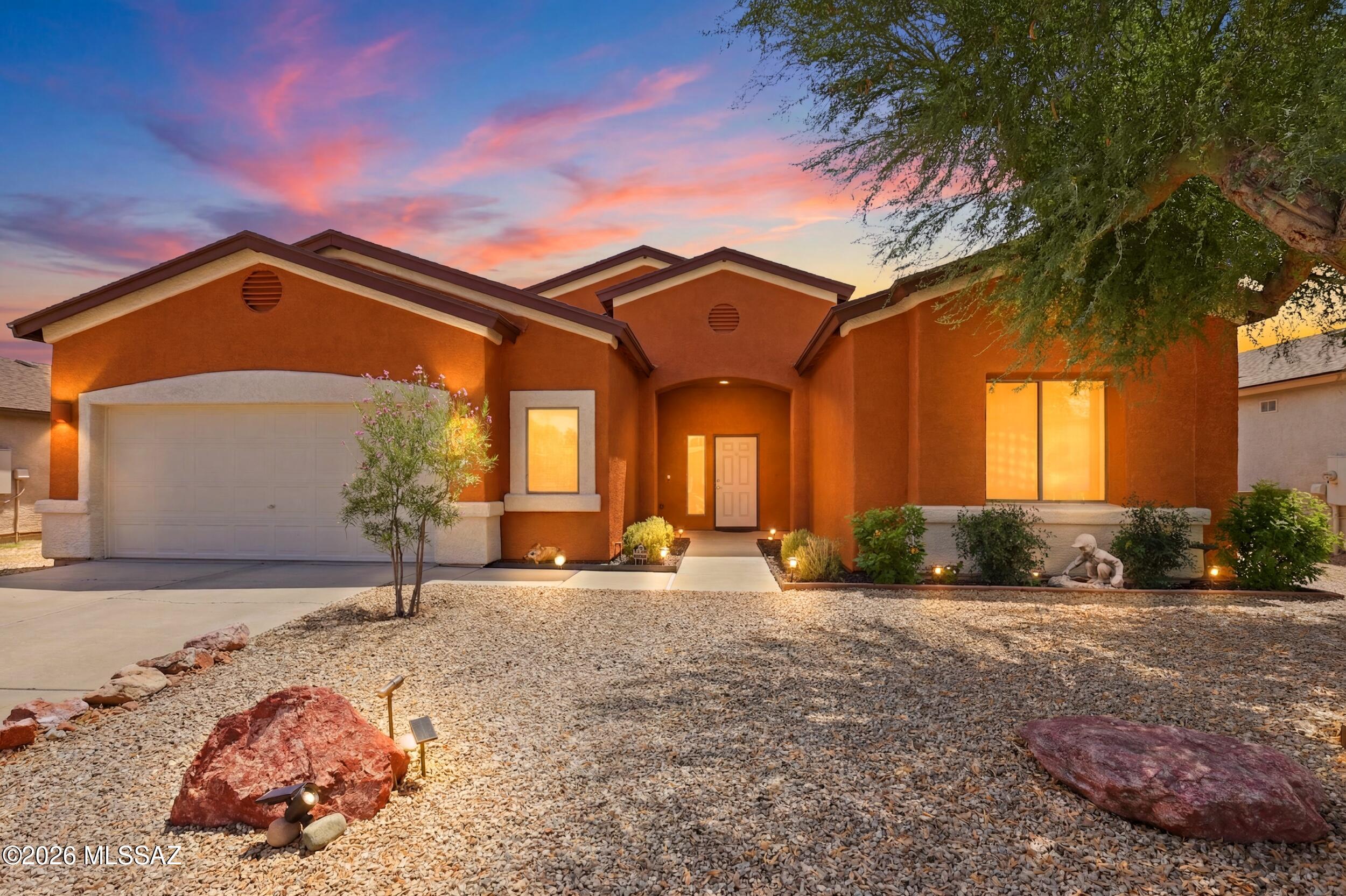Welcome to your beautiful new home nestled on the Southwest Side of Tucson. This spacious split-floorplan 3 Bedroom+Den, 2 Bathroom, 2,291sq.ft. home has been well taken care of with Matching Stainless Steel Appliances, Brand New Roof with warranty, Gas Fireplace, Solar Screens, a Professionally Landscaped Backyard with incredible Sunrise/Sunset Views that Arizona is famous for. Exterior of house has been freshly repainted. All thats left is for you to make yourself home. No rear neighbors gives you much needed privacy. Come see why this move-in ready home is ready for you to call home all at a tremendous value. Schedule a showing today!