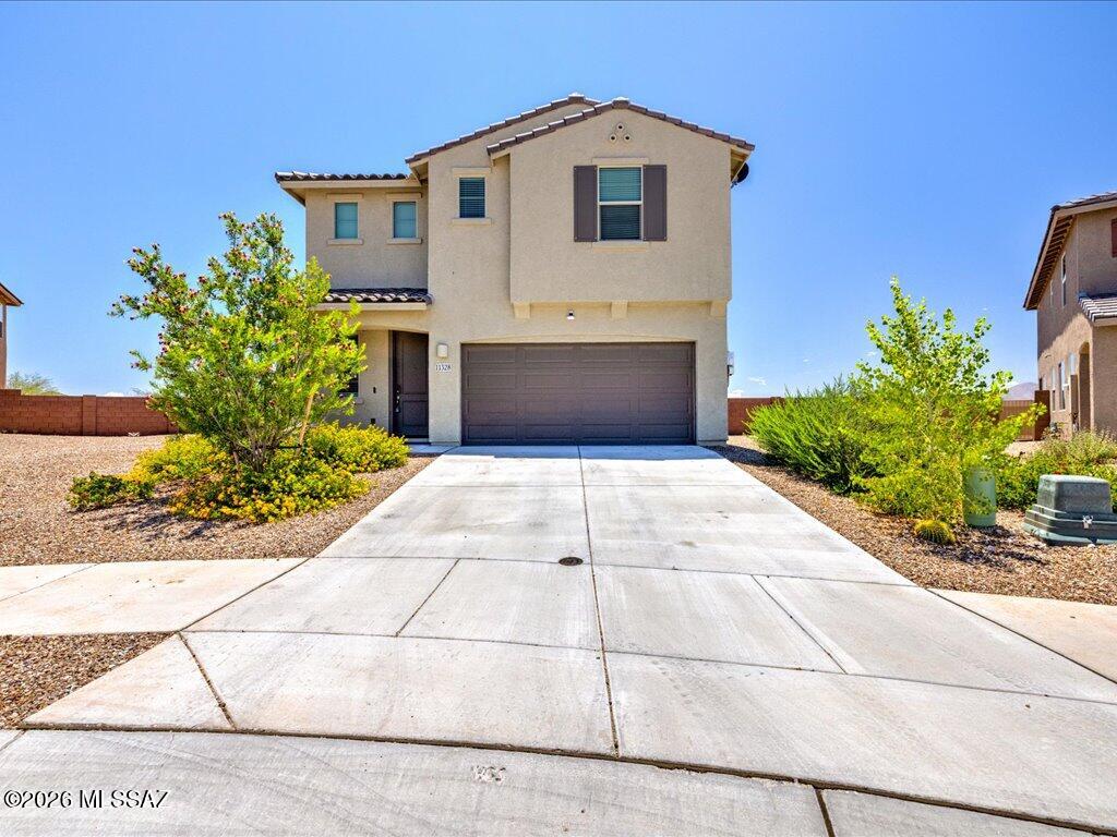 Now Vacant!! 2023-built Meritage home with solar, modern finishes, and a spacious open-concept layout. Offering 2,384 square feet, this home features 4 bedrooms, 2.5 bathrooms, and an attached 2-car garage. The kitchen opens to the main living and dining areas, creating a functional flow for everyday living and entertaining. The 0.23-acre lot provides plenty of outdoor space with room to design your ideal backyard retreat. Located within the Vail School District and offering the opportunity to enjoy a newer home without the wait of new construction. Move-in ready with energy-efficient features and solar already in place.