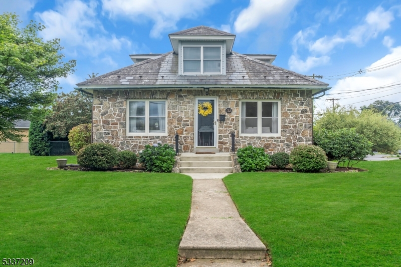 Charming Stone Cape in Desirable Delaware Park. Welcome home to this enchanting 3-bedroom stone Cape Cod, perfectly situated on a generous size lot in the heart of Lopatcong Township. Your new home seamlessly blends classic mid-century character with a spacious layout designed for modern comfort. The stone exterior offers timeless curb appeal and enduring quality. Inside, discover a warm and inviting atmosphere featuring traditional Cape Cod architectural details. The expansive yard provides ample space for outdoor entertaining and gardening, Ideally located in an established neighborhood with easy access to local amenities and highly-rated Lopatcong schools, this home is a rare find for those seeking character and space in a prime Warren County location. Don't miss your chance to own this unique piece of Lopatcong history. ( The pool will be professionally opened )