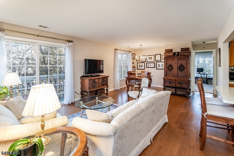 Beautifully maintained, this bright & airy, 2nd floor Chesterfield II model unit in the desirable Spring Ridge community is available immediately! Close to major highways 78,287,22, dining & shopping. Wonderful highlights include spacious living/dining room combination w/ sliders to private balcony, open kitchen w/ large breakfast bar, master bedroom w/ walk-in closet & versatile office/den/second bedroom option. Convenient detached one-car garage plus additional storage in basement level utility room. Amenities include in ground pool, tennis courts, playground, jogging/biking paths&clubhouse. No dogs allowed / indoor cats only.  Top rated Basking Ridge school system. #Some pictures are from previous listing