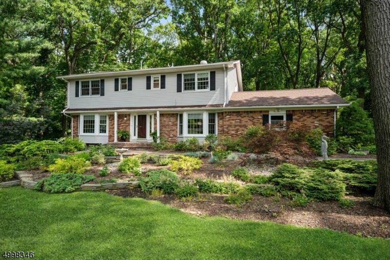 Meticulously maintained and renovated Colonial home in Powder Mill.  Large rooms with open flow, refinished hardwood floors and new custom molding creates a warm finished look throughout. Renovated kitchen is a chef"s delight, beauty and function. Huge Master Suite with 4 closets and a WOW bathroom totally renovated and enlarged features 2 separate vanities, frameless oversized shower with bench and 2 shower heads.  Features include roof 2012, new high efficiency boiler and instant hot water 2020, reverse osmosis drinking water and air purifier.  A wonderfully, tranquil, level and private acre with gardens and a deck to die for. Entertaining and living at its best.