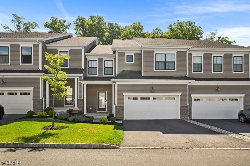 Exceptional opportunity to own a nearly new townhome in Venue at The American, one of northern New Jersey's premier active adult communities. The bright and open floor plan features beautiful hardwood flooring throughout and a quartz kitchen complete with abundant cabinetry and an oversized center island. The space transitions seamlessly into a great room anchored by a gas fireplace and dramatic vaulted ceilings. There is a luxurious first floor primary ensuite bedroom, upstairs there are two additional bedrooms, a loft, a full bath and a storage room. This is a pristine home in an amenity filled community, close to shopping and restaurants with easy access to NYC. Come see this beautiful home today!