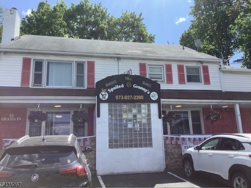 Exceptional opportunity to own a well-established, family-owned restaurant that has been successfully operating for over 30 years with the same owner. This turnkey property offers a thriving business along with two income-producing apartments above, creating multiple streams of revenue. The property has been well-maintained and features a new boiler, updated roof, and attractive exterior lighting. Ample parking is available in the rear for tenants and customers. Located in a high-visibility location with strong community presence and a loyal customer base, this is a rare chance to purchase a successful, long-standing business with added rental income potential. Perfect for an owner-operator or investor looking for a proven establishment with upside opportunity. This is packaged together with the business. MLS# 4031098.