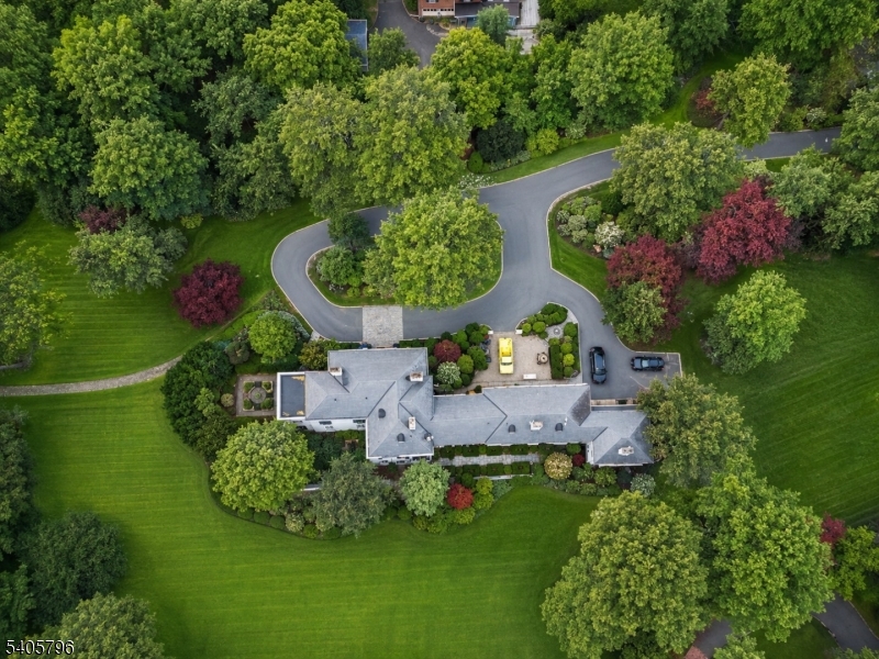 Spectacular , majestic 8500 sq ft French Manor home with high ceilings, amazing details, totally renovated to perfection, offers unparalleled grandeur, listed in NJ Register of Historical Homes, ideally located on 3.30 totally level acres, the ultimate in privacy only 12 miles from Manhattan. 80 Glen Ave boasts 9 bedrooms, 7.2 baths, 6 fireplaces as well as a sauna & elevator. The 1st level includes a conveniently located bedroom and powder room , as well as a beautiful updated kitchen with all new stainless steel appliances, dining room with marble fireplace family room, living room with fireplace , office and powder room. The 2nd level features luxurious primary suite with custom closets , spa like floor to ceiling marble bath , spacious bedrooms and baths, . The lower level has laundry room and is walkout to the gorgeous backyard. There is an apartment above the garage with a kitchen, living room, bedroom and full bath, and the garage has parking for 6 cars. The mansion is situated on totally level property in the gated community of Llewellyn Park, the 1st gated community in the country. This spectacular estate & beautiful home is available for immediate delivery. A gem that shouldn't be missed! New gas hot water heater !