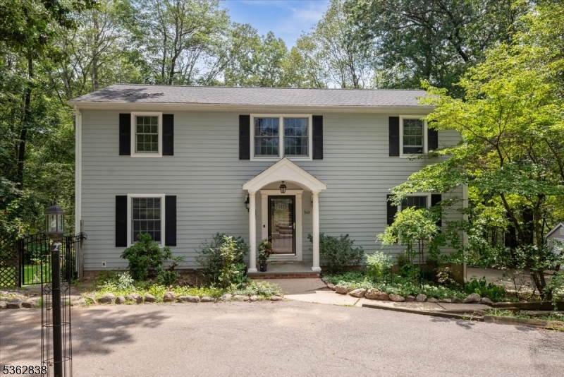 Please submit offers by Wednesday 8/13 5:00. Welcome to this beautiful colonial situated on a two acre wooded lot. Enjoy nature in all its glory from the back deck, lower patio or various places in the yard. From the moment you enter you will fall in love with the fantastic layout. Custom kitchen offers a generous center island, stainless steel appliances and who doesn't love a fireplace in adjoining breakfast room while cooking and entertaining. Move through the double doors at the back of the kitchen and enter the large bright living room with access to a massive family room that will not disappoint with its wall to wall windows and access to the deck. Second floor boasts 4 bedrooms, main bath and primary bedroom with en-suite and walk in closet. Entire house hasnewly refinished wood floors and has been freshly painted. Nothing to do but move in. As if that is not enough home is clad in concrete board and has been freshly power washed, fully fenced in yard is ready for your furry friends and there are many places to explore beyond the fencing into the wooded lot. Over sized 2 car garage and additional shed round out this fantastic home. Fireplace is AS IS with no know problems.