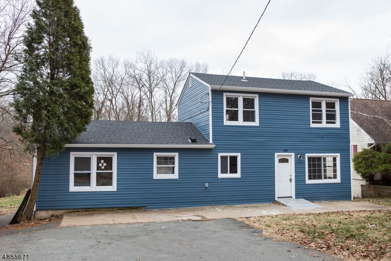Fully Renovated 3 Bedroom 2 Full Bath Colonial with bonus room for office or 4th bedroom in Great Location Close to Lake Hopatcong for boating, fishing, and Restaurants. Close to Route 80 for an easy commute.  Brand new Roof, Windows, Siding, Electrical, Plumbing, High efficient Heating/Cooling, Gleaming Hardwood flooring through out the home. New stainless steel appliances.Recessed lighting  for a bright open home.