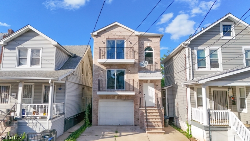 Turnkey two-family in the heart of Newark   completely renovated from top to bottom and ready to perform from day one. Both units have been fully updated with modern finishes throughout, offering bright, comfortable living spaces that today's tenants demand. As a bonus, the property features an additional recreation room   ideal for extra living space, a home office, or flex use. Situated in a prime Newark location, residents enjoy easy access to public transportation, making commutes a breeze, with a variety of restaurants and local amenities just steps away. Whether you're an investor looking for a turnkey addition to your portfolio or an owner-occupant seeking a move-in ready home with built-in income, this property checks every box.