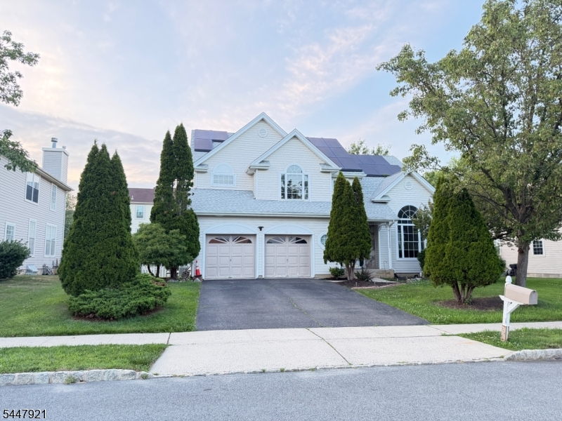 Location...Location...Location...Spacious and Beautiful 4 BR / 2.5 Bath single family home in the heart of Scenic Lopatcong Township. Colonial style with wrap-around and open floor interior layouts. Beautifully located in the "Country Hills" community. Hardwood Floors. New Roof approx. 5 years old. Large Windows. Plenty of daylights.Spacious and high ceiling entry foyer with elegantly turned staircase. Builder's SIGNATURE rounded corners & arched Openings! 9' Ceilings-1st level. Living room with cathedral ceiling, crescent topped windows. Floor to Ceiling columns. Chandelier. Bay Window Kit w/42" Cabinets, Cut STONE Backsplash, GRANITE, PANTRY. BRKFST RM w/TRANSOM Topped SLIDERS. FR w/RECESSED,W/B FP & HARDWOOD! 1st Flr Laundry & Half Bath! PRIMARY Ensuite w/CATHEDRAL, RECESSED, 2 Closets (1 is a WALK-IN), H/W Flr, CRESCENT Topped Window & EN-SUITE Bath with cathedral, Soaking Tub, Shower & Dual Sink Vanity! 3 Add'l BR's all w/Overhead Wiring (2 have Light/Fan Fixtures), Closets.Hall Bath w/DUAL Sink Vanity! LINEN Closet. Full and huge basement 2 Car Garage. Paved Drive. Barbecue Deck. Solar Panels, $179/month. Close to Shopping centers, Major highways and schools. Freshly Painted.