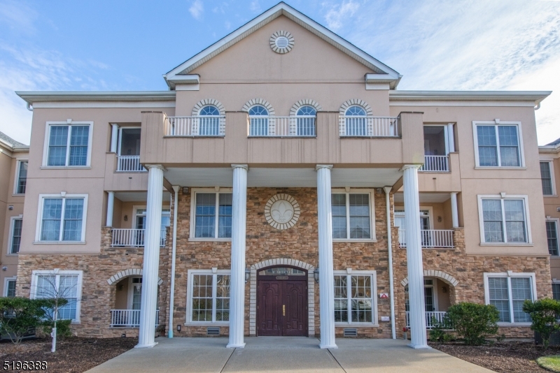 Bright and Spacious 3rd Floor desirable Buckingham Model unit with High Ceilings overlooking beautiful Trees & Manicured gardens. Sought after Floor Plan with 2 Bedrooms & 2 Full Baths, huge Living room/Dining room open to Kitchen. Primary Bedroom has Large Walk-in closet & Large Full Bath with Soaking Tub and Separate Shower. Elevator nearby takes you to lower level to Indoor Assigned Parking Spot (#39) in Garage & Storage Unit. Fantastic ACTIVE Adult 55+ Lifestyle! CLUBHOUSE - 26,000 sq ft with INDOOR POOL, Jacuzzi & Sauna, GYM, Billiard & Card Rooms, Library, Ballroom. Dozens of CLUBS & lots of Activities! For Outdoor Fun -Large POOL, Tennis, Pickleball, Bocce, Shuffleboard, Gardening. Community is conveniently located close to Shopping, Restaurants, Parks, Movies &other Entertainment. EZ access to Route 80 & nearby NYC Transportation by Train & Bus. Significant to note- This Community Only has- Free JITNEY to Mall, Shop Rite, Costco, & 24 Hour manned Gatehouse. Just MOVE IN and Enjoy Vacation Lifestyle!