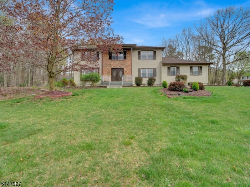 WELL-MAINTAINED 4 BR COLONIAL ON OVER 3/4 ACRES IN DESIRABLE ALEXANDRIA NEIGHBORHOOD IN SUCCASUNNA.. FEATURES INCLUDE LARGE KITCHEN WITH NEWER STAINLESS STEEL REFRIGERATOR AND SEPARATE DINING AREA WITH SLIDERS LEADING TO THE ENTERTAINING-SIZED DECK, HUGE PATIO, CONTAINED GARDEN & YARD WITH 2 SHEDS. YOU WILL APPRECIATE THE NEWER WOOD FLOORS IN  FAMILY ROOM & THE GAS FIRE PLACE. SPACIOUS LIVING ROOM AND DINING ROOM. LAUNDRY, MUD ROOM & POWDER ROOM COMPLETE THE FIRST FLOOR.  ON THE 2ND LEVEL, NICE SIZED MASTER BEDROOM WITH LARGE WALK-IN CLOSET, SITTING AREA, FULL BATH, PLUS 3 ADDITIONAL BEDROOMS  UNFINISHED, YET SEALED BASEMENT WITH TONS OF STORAGE AREA. ENJOY THE TOWN COMPLEX AT HORSESHOE LAKE WITH SPORTS FIELDS, BEACH, PLAYGROUND, REC. CENTER & MORE.
