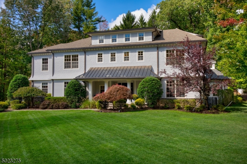 Estate living in Short Hills! Impeccable architectural details & all amenities in this stunning 6 BD, 6.5 BA Pinnacle built cust hm w/over 8K+ SF & access to Blue Ribbon schls & nearby NYC transport! Boasting impeccable architectural details & sitting majestically on lush property w/patio & top of the line hot tub! Open f/p & easy liv btwn indoors/outdoors. Enorm Gour Chef's Kitch w/cust cabinetry, granite/Sub-Zero/Wolf appls. Gorg Fam Rm w/stone fireplace. Frml Liv & Din Rms, 1st lvl Office. Mudroom, Butler's Pantry & 1st lvl Guest Suite. Breathtaking MBR Suite w/Library, spa-like bath, builtins & 2 HUGE w/in Clsts& 2 cust shoe clsts. 3 other ensuite beds on 2nd lvl. 2nd lvl Laund Rm. LL w/AMAZING Hm Theatre, Exerc Rm, additional Suite & tons of storage. 3 Car Gar. Incredible opp for hi-luxury estate living!