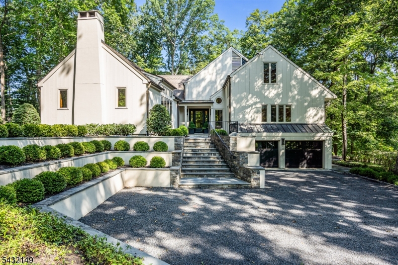 Set on beautifully landscaped grounds overlooking Bedens Brook Country Club, this distinctive residence blends thoughtful design, unique architecture, and exceptional indoor outdoor living.A grand foyer introduces the home's character and craftsmanship, leading into a main level designed for both everyday living and entertaining. The kitchen features a large center island, quartz countertops, double Wolf ovens, and a built in Sub Zero refrigerator, opening to a stunning patio with a built in grill and sweeping golf course views. A sunlit dining room with vaulted ceilings and walls of windows flows into the living room and a warm family room and library with beamed ceilings. This level also includes a private office with adjoining sitting area, laundry room, half bath, and an en suite bedroom.Upstairs offers three bedrooms, including two en suites and a charming third with a loft.The lower level features a home theatre, additional living space, half bath, and walkout to a second patio, along with access to the two car garage. A fully finished basement with high ceilings adds further flexibility.Surrounded by mature landscaping in a highly desirable Skillman setting, this is a truly special home that is best experienced in person.