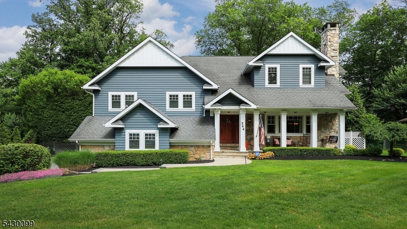 Nestled on generous 1/2 acre of level parklike property, meticulous  home w incredible sense of proportion, near Beechwood School. Curb appeal begins w bluestone walkway to classic front porch w swing. Bathed in natural light that accents hw floors w mahogany inlays, elegant moldings,& built-in surround sound system. Heart of home is vaulted family room, wood-burning fpl serves as stunning focal point,flowing seamlessly into gourmet chef's kitchen. Culinary space w Thermador range, pot filler,& granite-topped island ideal for a brkfst bar,wall of windows offers views of sprawling yard. Transition between indoor and outdoor living is effortless, custom patio serves as warm-weather getaway. Outdoor oasis w full kitchen w grill, side burner, sink& fridge + full bath addtl prep space for EZ entertaining. Functional "drop zone" mudroom w ample storage w direct access to oversized 2car garage. Lower level  rec room w wine closet, workout area &media room wet bar & mezzanine seating. Upper levels designed for ultimate comfort, 3 spacious bedrooms all w custclosets,served by convenient laundry room. Primary suite-true sanctuary w vaulted ceilings & abundance of sunshine w private office, 2 custom WIC & space for quiet sitting area. Spa like primary bath w-soaking tub under bright skylight, XL stall shower, dual vanities, & separate WC. Multi-zone climate control to the expansive storage lofts,every inch of this home has been thoughtfully refined for a lifestyle of ease and elegance.