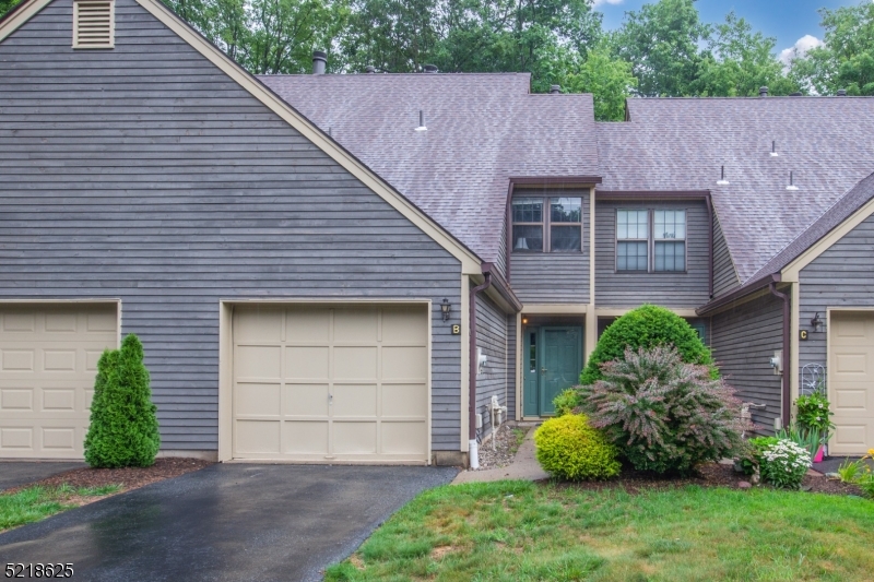 Welcome to your new commuter's delight in Bald Eagle Village! This townhome is conveniently located just minutes from major highways, restaurants, and shopping. The 2 bedroom, 1.5 bathroom home features a 1 car garage, 2nd floor laundry, and a private patio. The open concept dining and living room boasts a wood-burning fireplace, perfect for cozying up on chilly evenings. The charming kitchen was renovated in 2021 and features white cabinetry, generous counter space, and stainless steel appliances. The bathroom was also updated in 2021. Sliding doors off the living room lead to a relaxing deck where you can enjoy nature. The home comes fully furnished at no additional cost to the buyer. Amenities include a clubhouse, playground, tennis courts, gazebo, and pond.