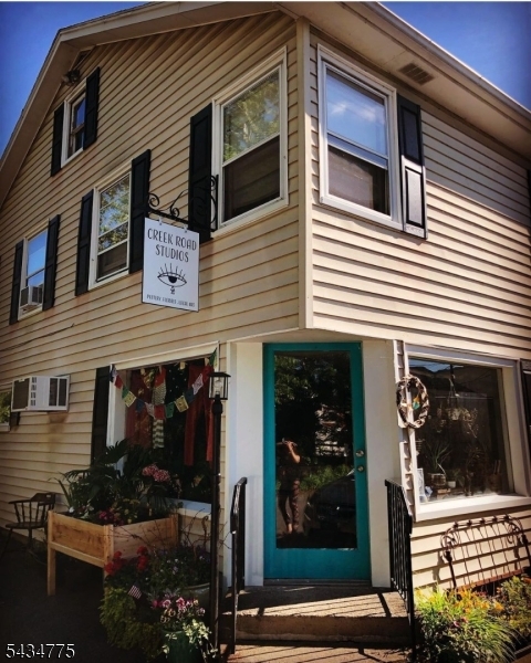 Set in the center of Milford?s vibrant and historic river town, this mixed-use property offers the perfect blend of small-town charm and modern convenience. Surrounded by thriving local businesses, cafés, and a charmingM ain Street, it?s an ideal opportunity for both investors and owner-occupants.The first floor features a versatile commercial space for a wide range of business uses?perfect for retail, professional services, studio space, or your next entrepreneurial venture. Large display windows and strong street visibility make it easy to attract foot traffic from Milford?s active downtown. There are two dedicated on street parking spaces adjacent to the building and a large free public lot at the end of the block. Upstairs, a beautifully renovated two-bedroom apartment provides spacious, comfortable living with hardwood floors, a brand-new kitchen, and generous natural light throughout. Whether used as an income-producing rental or an owner?s residence, the apartment adds tremendous value and flexibility.With its prime location, updated living space, and ready-to-use commercial storefront, this property is a standout opportunity in one of Hunterdon County?s most charming river towns.
