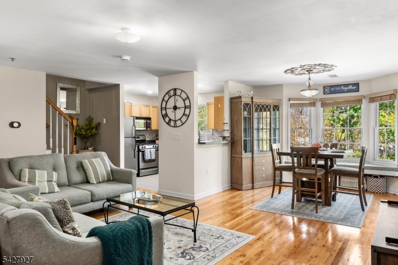 Welcome to this beautifully maintained Sun Valley townhouse at 30-13 Federal Hill Road, where comfort, convenience, and pride of ownership come together in a truly inviting home. With its open-concept main level, this residence offers an easy, natural flow between the living room, dining room, and kitchen, creating the kind of layout buyers love for both everyday living and entertaining. The kitchen features stainless steel appliances and a separate dining area, while the main floor powder room adds everyday convenience. Upstairs, you'll find a spacious and versatile den, laundry, and two well-sized bedrooms, including a generous primary suite with a walk-in closet and a private bath complete with a jetted tub and stall shower.Additional highlights include an attached one-car garage with a separate entrance, driveway parking, central air, forced hot air heat, and gas utilities. The roof has been replaced, adding valuable peace of mind, and the community offers shared outdoor gathering spaces for HOA members to relax and connect. Located close to shopping, dining, and major highways, this home offers a great blend of suburban convenience and attractive townhouse living. If you're looking for a well-kept home in a sought-after Pompton Lakes location, this one is ready to impress.
