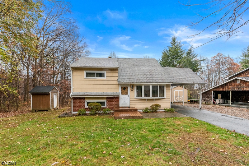 OWN THIS SPLIT LEVEL ON LEVEL PROPERTY WITH DETATCHED GARAGE, PLENTY OF PARKING, UPDATED EAT-IN-kITCHEN, SPACIOUS BEDROOMS, LOWER LEVEL FAMILY ROOM W/ACCESS TO MUDROOM, LAUNDRY & BACKYARD. PRIVATE YARD SETTING.....HOME BEING SOLD AS-IS--PRICED TO SELL!  ANNUAL TAX ESTIMATED APPROX. $8K PER YEAR. CHECK / LOCAL TAX ASSESSOR,