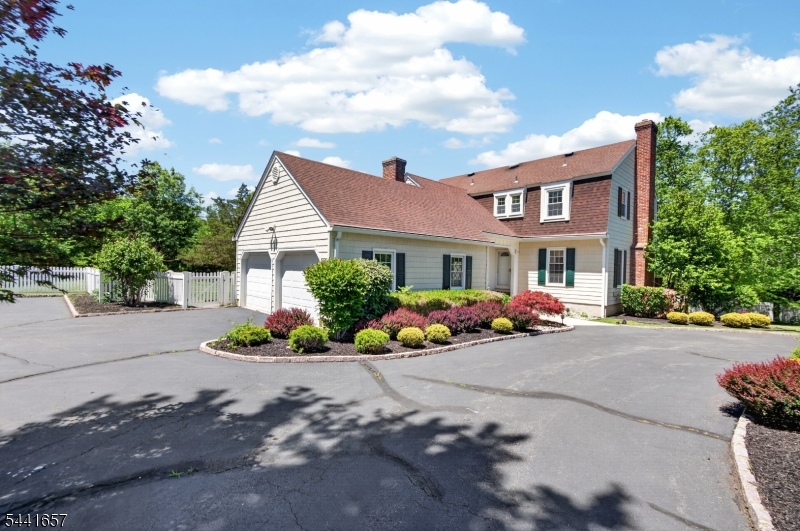 Nestled on approximately 6 scenic acres in desirable Readington Township, this spacious home offers privacy, character, and endless possibilities. Featuring 4 bedrooms, a versatile bonus room, 4 full bathrooms, generous living spaces, a sun-filled four-season room, and beautiful views of the surrounding property, this home provides the perfect opportunity to create your own private retreat.The finished walk-out basement adds exceptional living space and features a large recreation/living area, a separate bonus room ideal for a home office, gym, or hobby space, a full bathroom, and direct access to the backyard through sliding glass doors.The property also includes a barn/outbuilding and expansive grounds ideal for recreation, hobbies, storage, or future improvements. Whether you're seeking peaceful country living, room to grow, or a property with tremendous potential, this unique offering is ready for its next chapter.Conveniently located near shopping, dining, major commuter routes, and all the charm of Whitehouse Station and Readington Township. The property is also equipped with a newer whole-house backup generator installed in 2025, powered by a dedicated above-ground propane tank, providing added convenience and peace of mind during power outages.