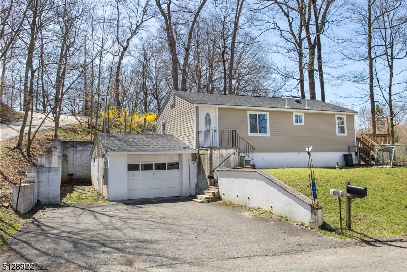 Why Rent when you can own!!! Beautiful Renovated in 2018 2 Bedroom 1 Bath raised ranch with 1 car garage in the Lake Neepaulin section of Wantage township. Enjoy fishing, boating, and swimming and much more...Updates include new Electrical, Plumbing, Roof, Windows, High efficient Ductless Heating/Central Air Conditioning Units. Gleaming Bamboo Flooring ,Cabinets, Quartz Countertops, and Stainless Steel Appliances. Plenty of light with recessed lighting all throughout the home.