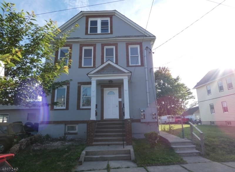 You don't want to miss out on this beautifully renovated four family home! Great for investors and in very populated area! Very close to stores and public transportation! All units are 2 bedrooms each and very nicely updated kitchen! Will sell fast! Newly renovated attic! Ready to move in!!