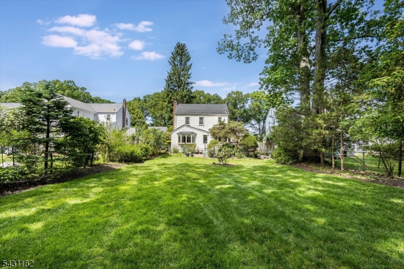 Quiet street. Traditional Colonial w/ two additions. Near Harrison School. Deck overlooks yard with border of shrubs and trees.Potential for use as currently set up or possible for renovations or new construction.