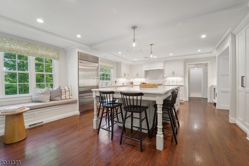 An exquisite lifestyle awaits at this beautifully renovated 5 bedroom, 5 full bathrooms and one half bathroom Colonial situated on a meticulously landscaped private lot in one of Madison's most premiere neighborhoods of the Hill section.  The heart of the home is the impressive custom chef's kitchen with oversized center island, which flows beautifully into the large family room and dining room that makes this home an entertainer's dream.  The first floor is completed by a massive living room, first floor guest ensuite with full bath, laundry room, and powder room. Upstairs is the incredible, light-filled primary suite with two walk-in closets and a large bathroom with a jetted tub and walk-in shower. Three additional spacious bedrooms are down the hall, one with an ensuite, and the other two bedrooms are joined by a lovely bathroom.The newly finished basement holds a home gym, a cozy spot to watch movies, and additional open space to suit all of your needs. The backyard provides the ultimate retreat with an outdoor fireplace and large paver patio. Close to town, Midtown Direct train to NYC, and Madison's top rated schools!  Fireplaces, chimney, and flue are in as-is condition.  No known defects.  BEST & FINAL ON TUESDAY, SEPTEMBER 17th BY 5PM.  Please refer to offer guidelines.