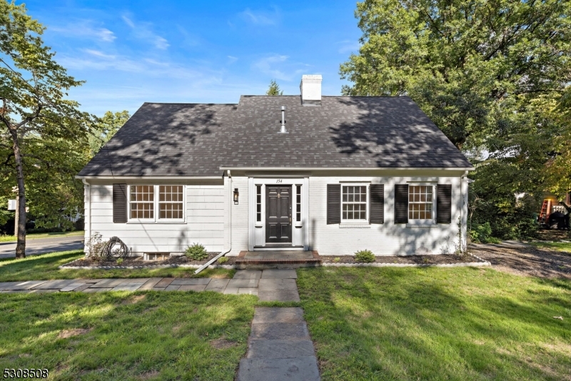 Welcome to this charming and beautifully updated Cape Cod home featuring 4 bedrooms and 2 full baths. This move-in-ready rental offers an open living and dining room with a cozy wood-burning fireplace, a brand-new kitchen, and hardwood floors throughout. Enjoy the lovely side porch overlooking the expansive property, plus a full unfinished walk-out basement, attached 1-car garage, and abundant storage space. The terraced backyard provides a peaceful setting along a private country lane. Recent updates include a new roof, heating system, central air, and flooring. Conveniently located near shopping, dining, and train service to NYC, making it an ideal home for both comfort and commuting.