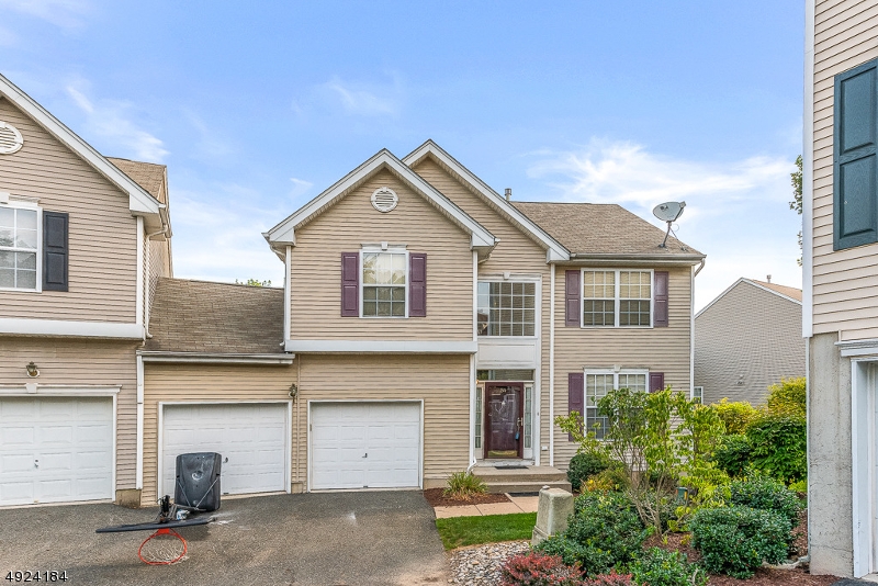 **Rare Find** This beautiful end unit townhouse was the original Canterbury Model home for Woodfield at Mt. Olive which means this home boasts all the bells & whistles including a finished walkout basement and a TWO car garage.  Additional upgrades include: stylish granite and maple kitchen, wood floors throughout first floor, 2-story living room with gas fireplace, den/home office with French doors, recessed lighting, window treatments, en suite master bedroom with walk in closet, two secondary bedrooms, two full bathrooms each with tub/shower, powder room on first floor, and plenty of storage.  Community amenities include: pool, tennis courts, baseball fields and walking paths.  Low-maintenance living in a convenient location just minutes from Routes 46/80, shopping, restaurants and more!