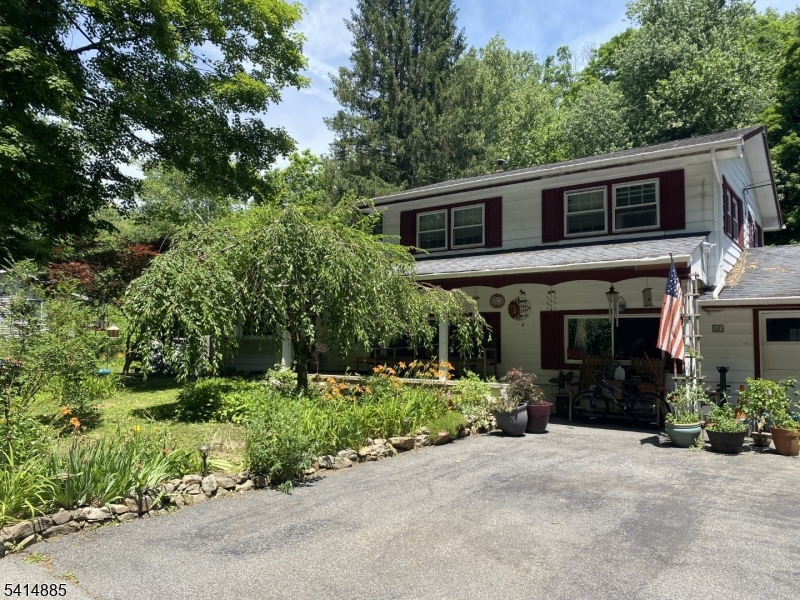 Spacious, well maintained split level home on dead-end street with oversize driveway and fenced yard backing to Spruce Run stream. Raised patio deck outside dining room area and kitchen. Above ground oil tank in basement. wood burning fireplace. Fenced chicken roost negotiable. Washer, Dryer and Refrigerator are excluded from the sale. Coming Soon! Closing is contingent on sellers finding a place to live, alreadty in process.