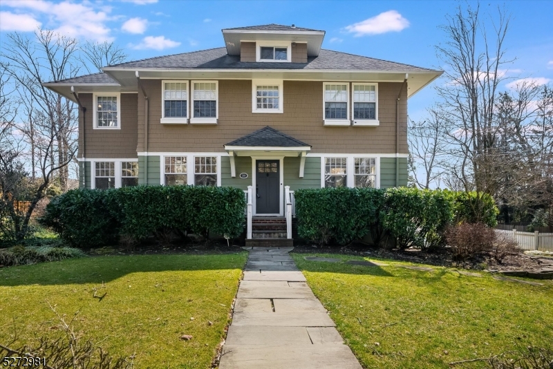 Presenting 20 Park Road, an immaculate Center Hall Colonial, crafted with the finest attention to design and detail. Hardwood floors, upscale finishes, custom built-ins throughout, this 4 Bedroom, 2.2 Bath vision, settled on a quiet cul-de-sac, is truly divine. Warm and welcoming Entry Foyer with natural sunlight pouring in from every direction. Exquisite Living Room with crisp coffered ceiling and focal slate fireplace. "Chef's Dream  Eat-In Kitchen boasts Quartz countertops, wood/glass cabinetry, Island, top-of-the line stainless appliances, including 3 Viking ovens (dual-air & 6-burner gas) and Fisher & Paykel double dishwasher  Plus, Butler's Pantry with wet bar and wine fridge. Head-out to the bluestone deck off Kitchen, and embrace views of the private, expansive backyard (double lot!) with stunning pool, which is utter perfection for easy living and entertaining. Charming Dining Room with wainscot paneling and lovely Powder Room complete 1st Level. 3 Bedrooms, including Primary Bedroom Suite, reside on 2nd Level, all bright with hardwood floors and fabulous closets; and Primary Bedroom En-Suite Bathroom shines with double marble vanity and unique glass door combination shower/steam room, as well as a soaking tub. Work-out on the Lower Level in the exercise room, or convert to Home Office, Playroom, etc. Best schools, NYC commute, and literally up the street from downtown Millburn, 20 Park Rd has good flow, great vibes, and that "WOW!  factor you want in your next home!