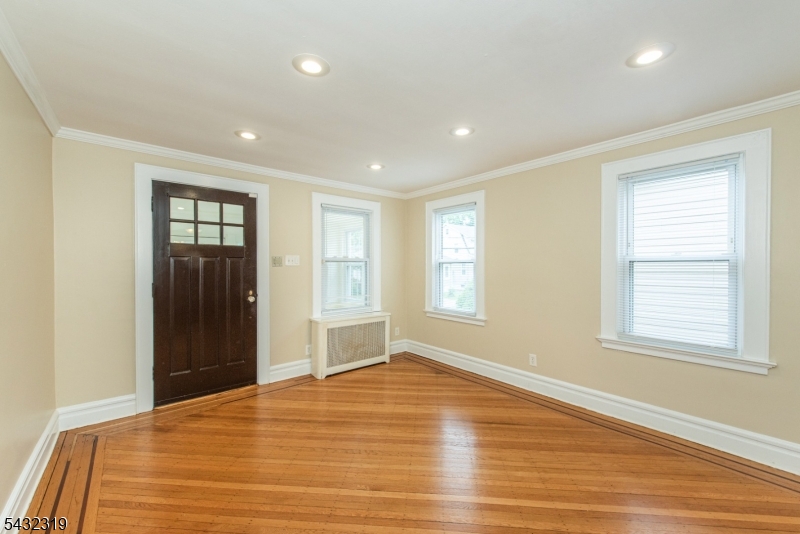 Don't let "needs updating" scare you off, this beautiful cape cod is the opportunity you've been waiting for. With three bedrooms and three full bathrooms, hardwood and laminate flooring, living room, formal dining room, kitchen and a finish basement with laundry room and a full bathroom. The layout works and the space is real. A spacious primary suite with a full bathroom complete the second floor. Step outside the sliding doors, off the kitchen onto your deck and a generous yard that's ready for whatever you can imagine; entertaining, gardening, relaxing, you name it. A one car garage plus parking for 3 additional cars, parking is never an issue.  Location, location, location..You're close to NJ Transit with a direct ride into New York City, shopping, restaurants, schools in walking distance, house of worship and everything Maplewood has to offer right at your fingertips. A home with this much space, this much potential, and this kind of location doesn't stay on the market long. Come see it with fresh eyes and a little vision. You won't be disappointed.
