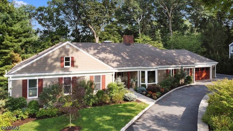 Gorgeous exp. ranch living at its best! Spacious FP for casual/formal entertaining.Stunning 4 BR, 3.1 bath. MBR features a BR-size walk-in closet w/ built-in wall shelves & island drawers. Kitchen has top of the line appliances, is spacious w/ bright, eating area & overlooks a beautiful front stone wall w/ magnificent landscaping. Large patio off kitchen entrance. Great laundry room w/ 2nd refrig. Kitchen leads to open concept DR/FR & includes built-in cabinets w/ under-lighting, fireplace & large LR. DR/FR/LR flow to a private, spacious porch, large deck & overlooks marvelous landscaped grounds. 2 spacious BRs & Bath on L2. The magnificent LL is complete w/ large entertainment & office area, billiard room/craft room, BR w/ full bath & large storage room. FR sliders open to another private patio. Must see!