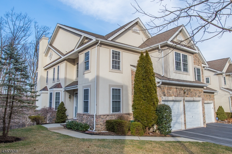 Stunning Syracuse End Unit w a great layout at The Forges! You enter into a bright 2 story foyer which leads past the den & then the formal dining room. The wall of windows offer lots of natural light to the open floor plan which is perfect for entertaining. Large family room w/gas fireplace & sliding doors to the deck overlooking wooded parkland. Kitchen boasts s/s appliances, granite, breakfast bar & seating. On 2nd floor you'll find a bright & airy loft, 3 bedrooms & 2 full baths. The master bedroom offers a sitting area,2 spacious walk in closets & en suite bath w soaking tub, separate shower & heated tile floors. The finished basement, is a huge rec space w/bar & walkout to patio, an additional bedroom(now used as gym) &full bath. Association offers Clubhouse w/Fitness,Tennis & Pool. Great commuting spot