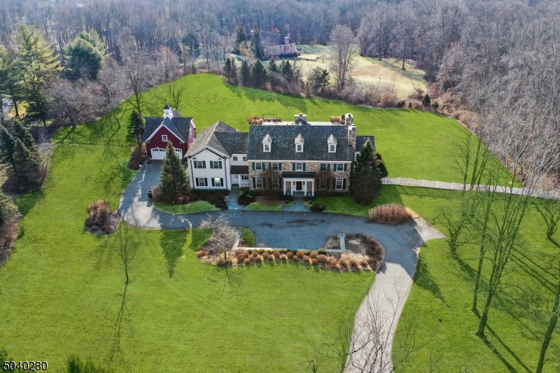 A wonderful opportunity to buy this diamond in the rough to restore to its glory days; 14 room Fieldstone Colonial sits on 4+ acres of level lot with an in-ground pool, carriage house, and more... The attention to architectural detail throughout this home is impressive; coffered ceilings, custom millwork, moldings, treatments, floors, doors, and built to last! This property is asking for your personal touch to bring forth its true beauty and high level of liveability. Come, look, imagine, and buy!
