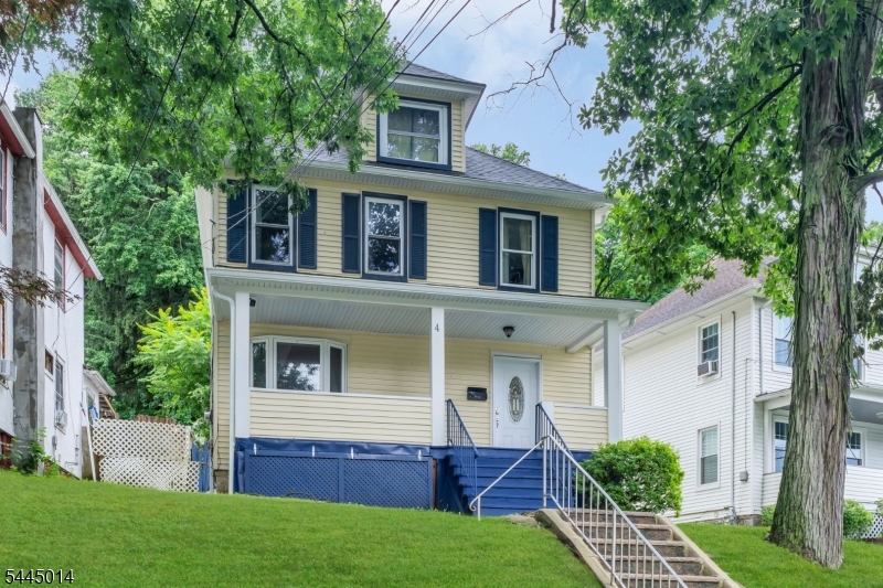 Spacious Colonial in the heart of Dover, offering 4 bedrooms and 2 full bathrooms. The covered front porch is the perfect place to relax before stepping inside. The first floor features a foyer, living room, formal dining room, eat-in kitchen with tile flooring and access to the backyard, an updated full bathroom, and an unfinished walkout basement. Upstairs offers decent-sized bedrooms plus a den or home office, a second full bathroom, and a finished walk-up attic. The home has been well maintained with updates including a newer roof and gutters (2019), a freshly painted interior, a power-washed exterior, a newer boiler, water heater, gas piping, and backflow preventer. Public water and public sewer. Conveniently located near Hedden County Park, Hurd Park, the Dover Station, Rockaway Townsquare, schools, Saint Clare's Dover Hospital, shopping, dining, and Routes 10, 46, and I-80.