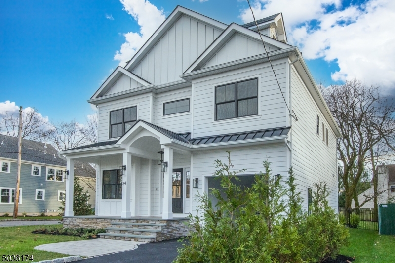 Your Madison Oasis! Love coming home to this exceptional NEW CONSTRUCTION colonial and enjoy the convenience of being only one mile to mid-town direct train, town, and Madison schools. Enjoy 4,118 sq. ft. of beautiful living BETWEEN 4 LEVELS. 9ft. 1st & 2nd floor ceilings. A designer kitchen features a Quartz island, Top of the Line Appliances, dry bar, wine fridge, walk-in food pantry, office space & opens to the great room with fireplace and access to patio. A large family room with coffered ceilings ensures plenty of space to make memories. Retreat to the master suite with tray ceiling, large walk-in closet & soaking tub. 3 inch white oak hardwood flooring throughout the house. Come and fall in love! PS Driveway in the back also belongs to the house!