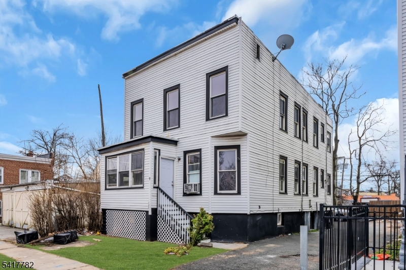 This beautifully redone two-family home is move-in ready and perfect for end users or investors! Unit 1 offers 7 rooms, including 4 bedrooms, 2 full baths, a bright living room, a stunning modern kitchen with new appliances, a dining area, and a full basement for extra living space. Unit 2 features 6 rooms with 3 bedrooms, 2 full baths, a welcoming living area, and a stylish new kitchen. Additional highlights include ample driveway parking that can accommodate 7+ cars, a rear yard, tasteful updates throughout, and a layout that combines charm, functionality, and modern comfort truly an exceptional opportunity for a turnkey property.