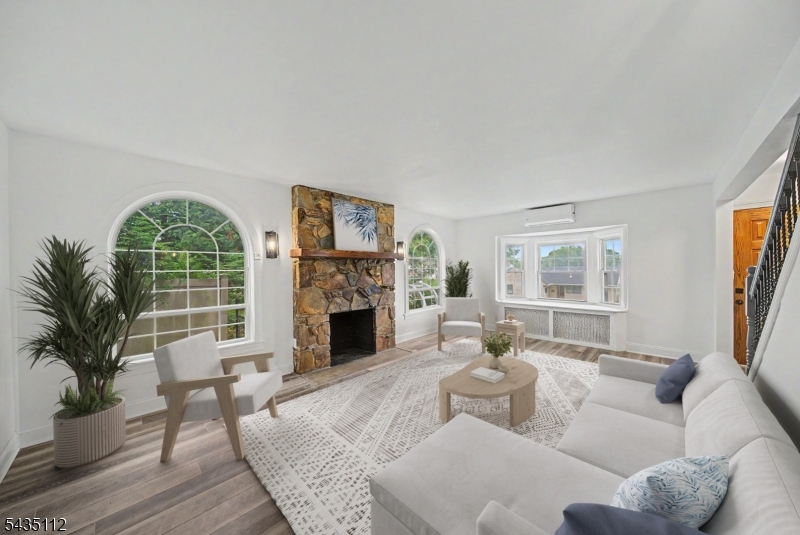 Nestled in the heart of Wyckoff this 4 BR, 4-bath home has been renovated in 2025-2026.  Thoughtfully redesigned with high-end finishes, offering the perfect blend of sophistication, comfort, and flexible living space. Major upgrades include new boiler/heating system, (whole-house mini splits), hot water heater and roof, providing peace of mind for years to come. The Living Room boasts striking arched windows gracing a stately stone wood-burning fireplace. The inviting all-season room features skylights & newer Palladian windows. Step out to the spacious wraparound deck perfect for indoor-outdoor entertaining. The primary suite features a cozy fireplace and renovated Spa-inspired marble bath complete with frameless shower & panel system, freestanding soaking tub, decorative framed his/her mirror cabinets, premium bidet & private sauna. Every bath in the home has been newly renovated with upscale designer finishes & modern elegance. Fully finished walkout lower level expands the home?s versatility with a newly renovated private full bath & 2 separate office spaces. Private setting with expanded rear parking. This exceptional home offers incredible combination of luxury, functionality, & comfort inside & out.