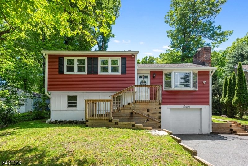 Welcome home to Denville, NJ! Don't miss this opportunity to own in the sought-after Indian Lake section. This 4-bedroom, 2-bath split-level home features many recent updates and upgrades, including an all-new kitchen with new appliances and an open floor plan ideal for entertaining and everyday living. Additional major updates include central air conditioning, a new furnace, and a new water heater. Newer mechanicals, combined with public utilities (public sewer, public water, and natural gas), add convenience to homeownership. Additional features include a deck, 3-season room, and large fenced backyard offering space for outdoor enjoyment, entertaining, or relaxing. Residents of the Indian Lake community enjoy optional access to 3 beaches, a clubhouse, and a variety of community activities. Conveniently located just minutes from downtown Denville shopping, dining, and entertainment, with easy access to Routes 80, 46, 10, 287, and 15, as well as nearby public transportation options. Not in a flood zone.