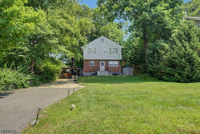 Welcome to this beautifully updated Colonial, ideally situated on a quiet dead end street in the highly desirable Lake Telemark. Enjoy the charm of this welcoming lake community, where residents have the opportunity to enjoy the private lake, beaches, fishing, kayaking, community events, & a peaceful neighborhood atmosphere, all while remaining within close proximity from major highways. Inside, you'll find a bright, open concept layout designed for today's lifestyle. The beautifully renovated kitchen flows seamlessly into the dining area and features quartz countertops, stainless steel appliances, radiant heated floors, and plenty of space for gathering and entertaining. Both full baths were tastefully renovated, offering modern finishes and timeless style. Primary suite with cathedral ceilings, two additional generous sized bdrms and a versatile finished 3rd floor provides valuable bonus space that currently serves as a bdrm but could also function as a home office, playroom, guest suite, or media room. Throughout the home, you'll appreciate abundant closet space and thoughtful storage solutions. The partially finished basement offers additional flexible living space along with plenty of storage. Outside, the inviting front porch creates the perfect place to relax, while the exceptionally long driveway provides plenty of parking. The home is also equipped with a Tesla charging station. Offering modern updates, flexible living space, this home is one you won't want to miss.