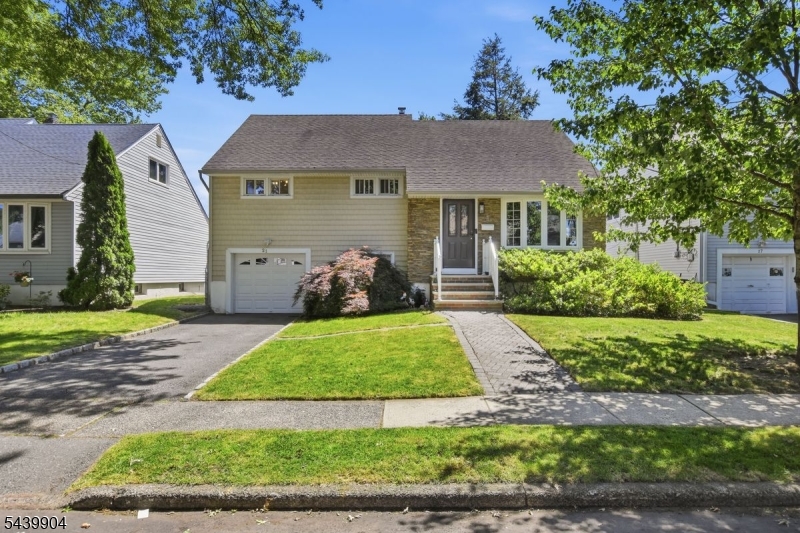 Welcome to this beautifully maintained split-level home in Bloomfield's sought-after Brookdale neighborhood. Tucked away on a quiet residential street, this spacious 4 bedroom, 2.5 bath home offers a flexible layout designed for both everyday living and effortless entertaining. The main level features a bright living room, formal dining room, and an updated open-concept kitchen with a breakfast bar perfect for gathering. Upstairs, you'll find three generously sized bedrooms, a full bath, and a primary bedroom with its own private powder room. The top level offers a fourth bedroom with an adjoining den, creating an ideal opportunity for a private primary suite, home office, or bonus living space. The ground level provides even more versatility with a den, full bath, and laundry area that can easily serve as a guest room, home office, or recreation space. A large finished basement adds valuable living area, perfect for a rec room, media room, gym, or retreat. Outside, enjoy a fully fenced backyard complete with a patio and fire pit area an inviting setting for outdoor entertaining, relaxing evenings, or weekend gatherings. An attached garage with an automatic opener offers additional storage and convenience. Ideally located just minutes from Brookdale Park, local shops, restaurants, schools, and commute to NYC, this home combines space, flexibility, and an unbeatable location. A wonderful opportunity to enjoy all that Bloomfield has to offer.