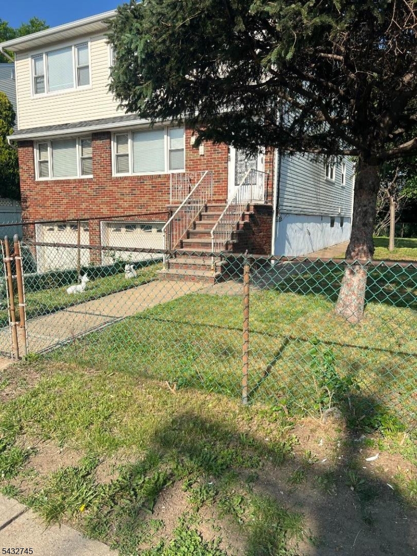 If you are looking for a sturdy well built 2 family with extra spacious rooms stay on this page! Strongly built 2 family situated on an extra large lot Enjoy the refreshing central air on floor1!All natural wood floors throughout.... totally fenced in private property  Beautiful park like yard. Great income potential.. this home is situated on a private street yet easy access to all hwys  call for showing info and more details