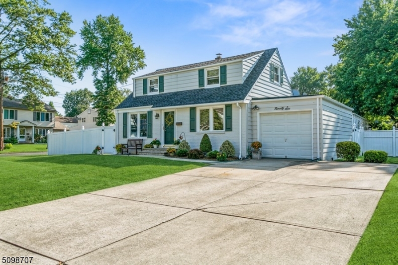 Impeccable 3bed/1bath Cape Cod situated on a manicured lot on a quiet street in Bergenfield. Convenient to shops, schools, restaurants & NJ Transit to NYC. 7miles NW of the George Washington Bridge. W/ Hardwood floors, crown molding & lots of natural light, you'll feel right at home. Eat-in kitchen offers ample cabinet & counter space + room for a dinette set. Two bedrooms on the 1st floor, including the primary bedroom & full hall bath. 2nd floor has a sitting room at the top of the stairs, followed by a large 3rd bedroom. Full basement offers extra storage, laundry, and unlimited possibilities for expanding your living space. Private back yard is manicured & fenced-in w/ plenty of room for a picnic table, playset, hammock, and more. An attached 1 car garage completes the package of this comfortable home.