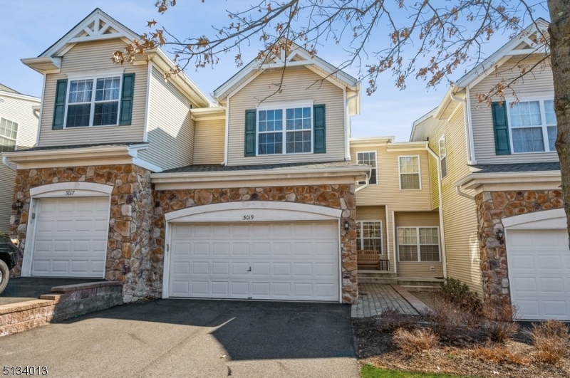 Spacious and modern townhome with 3 bedrooms, 3 full bathrooms and 1 half bathroom is nestled in a private and beautifully landscaped community. Amenities include tennis courts, a swimming pool and convenient commuter access. With 3 levels of living space, this luxury townhome features an open, airy layout with polished hardwood floors, nine foot ceilings, lots of natural light and beautiful sunrise views. Highlights include walk-in closets in all the bedrooms, a large balcony, a spacious walk-out lower level with a full bathroom and an attached 2 car garage.The generously proportioned interior flows effortlessly from the dining area to the living room with an elegant fireplace and outside to the private balcony where you can admire the treetop and mountain views. The open kitchen is spacious with stainless steel appliances and a sunny breakfast nook. A half bathroom completes this level.The 2nd floor includes a lavish primary bedroom suite with a vaulted ceiling, walk-in closet, and luxurious private bathroom with a jetted soaking tub and separate glass shower. There are two additional bedrooms, a full hallway bathroom and a convenient upstairs washer and dryer. The beautifully finished lower level offers an expansive FR with sliding glass doors to the rear property, along with a full bathroom perfect for guests. With its warm sense of community and only moments to shops, eateries, highways and parks, this townhome provides all the elements for an easy-care lifestyle.